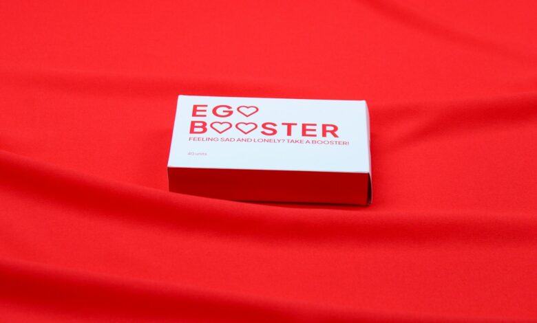 A red cloth with a business card on it